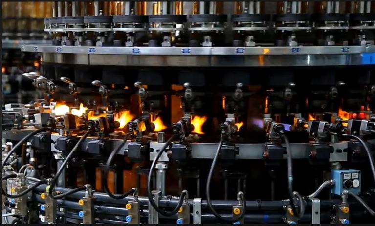 Ampoules being flame-formed on the rotary machine